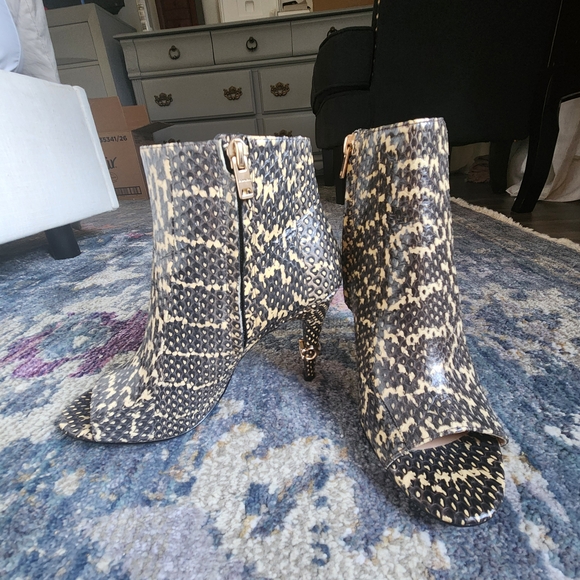 Coach Black and Cream Ankle Booties with Sleek Silhouette - Picture 1 of 11